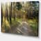 Designart - Road Through Green Pine Forest - Landscape Photography Canvas Print